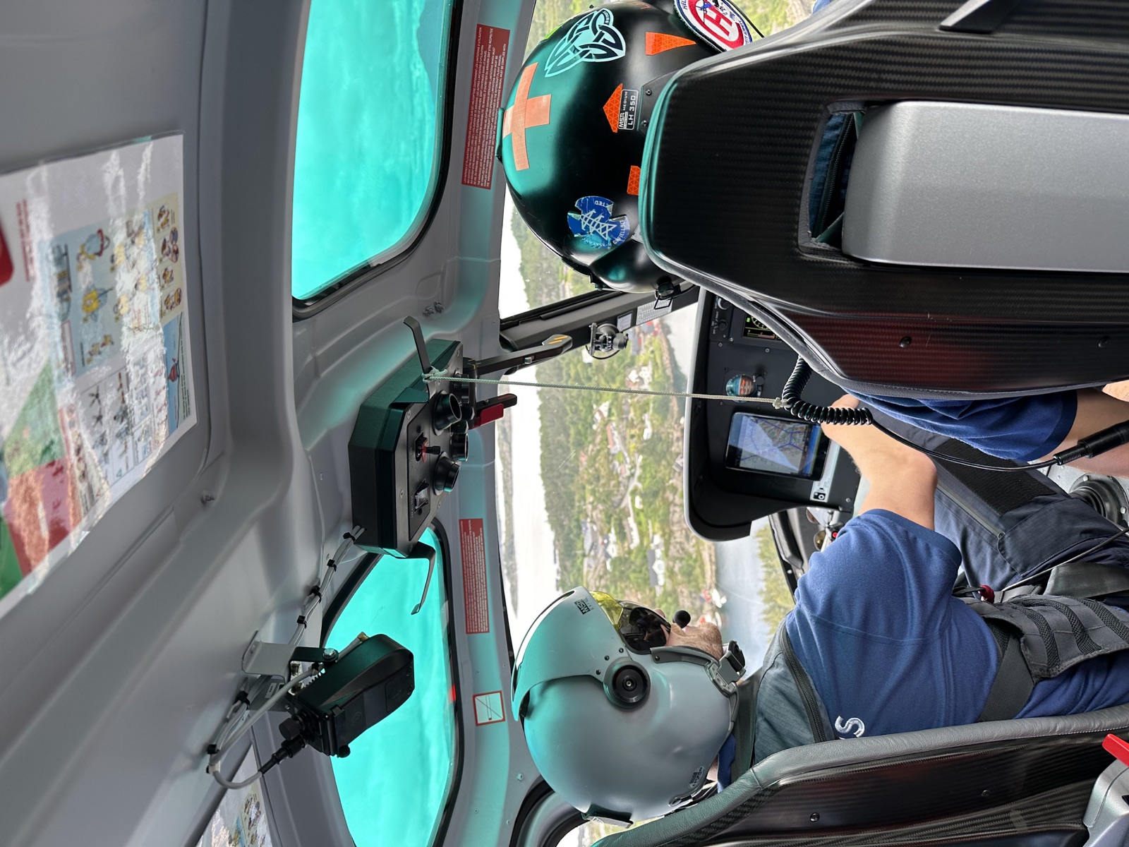 The view from inside a helicopter flying over the Arctic